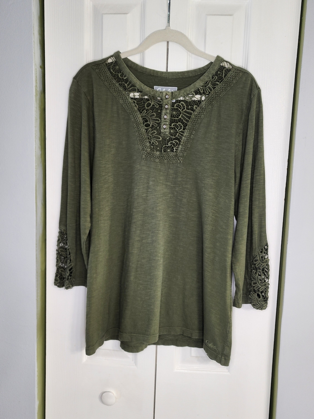 Cabela's Women's Crochet Lace Yoke Henley Top in an olive green knit.